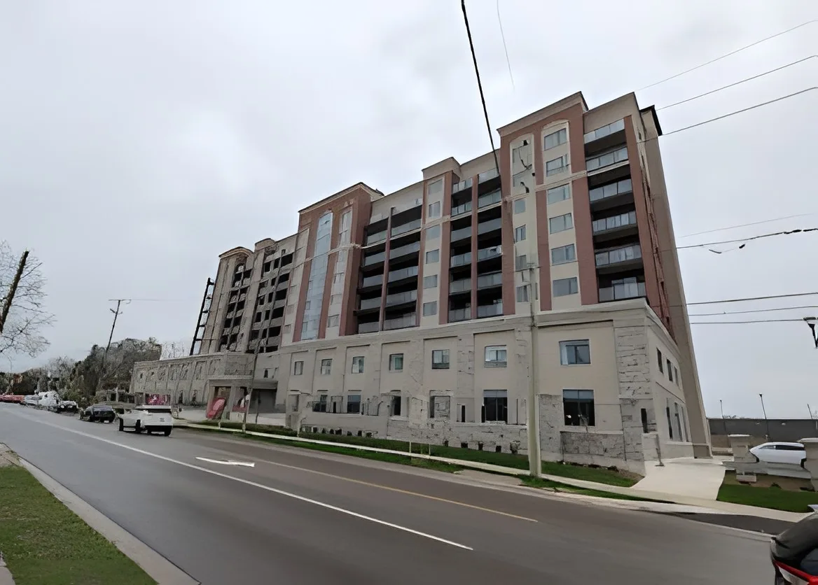 Completed mid-rise residential building on a city street