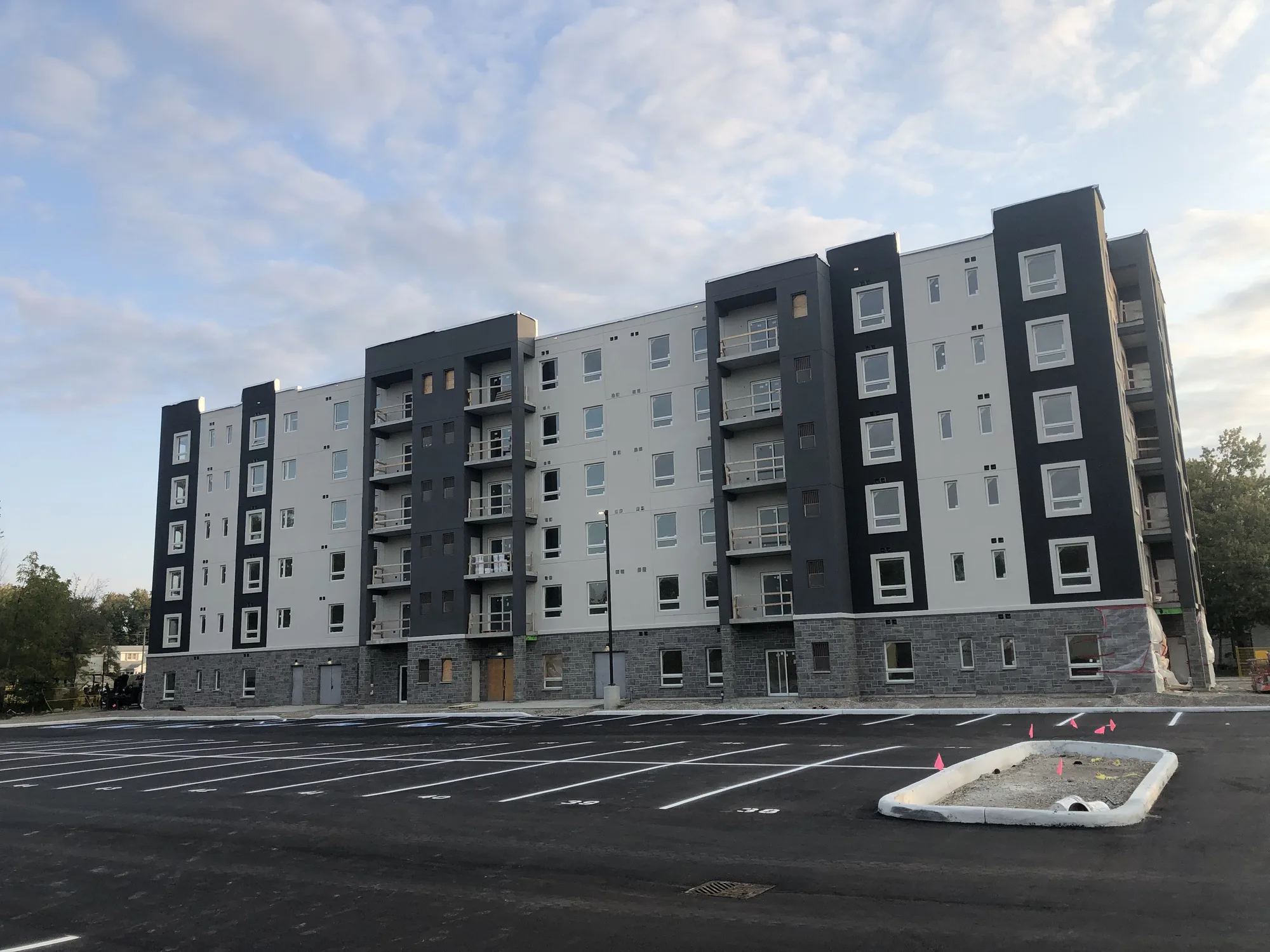 Completed mid-rise apartment building with a finished exterior
