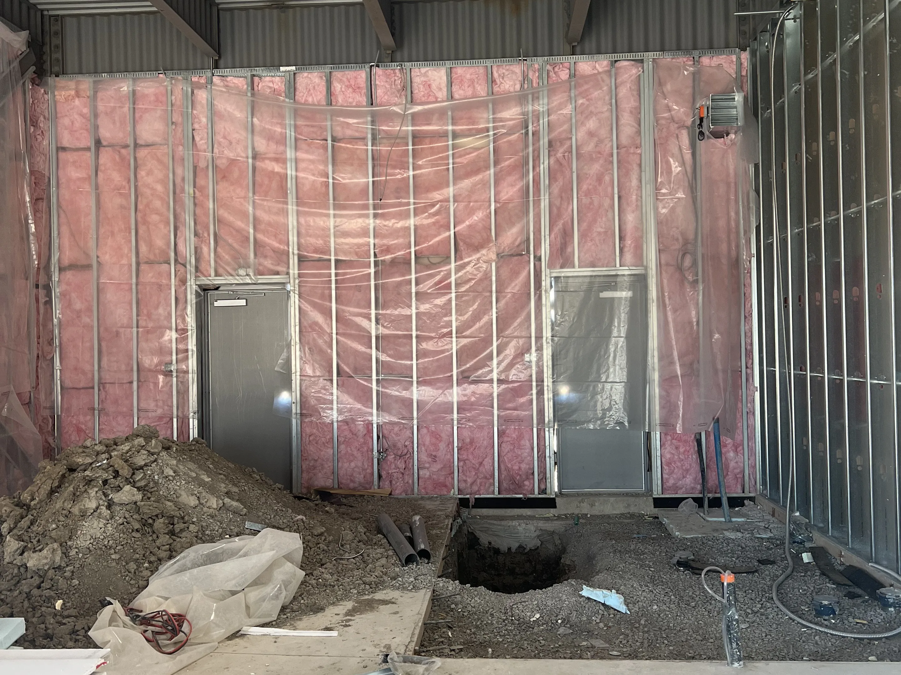 Batt insulation installed between studs in a framed wall