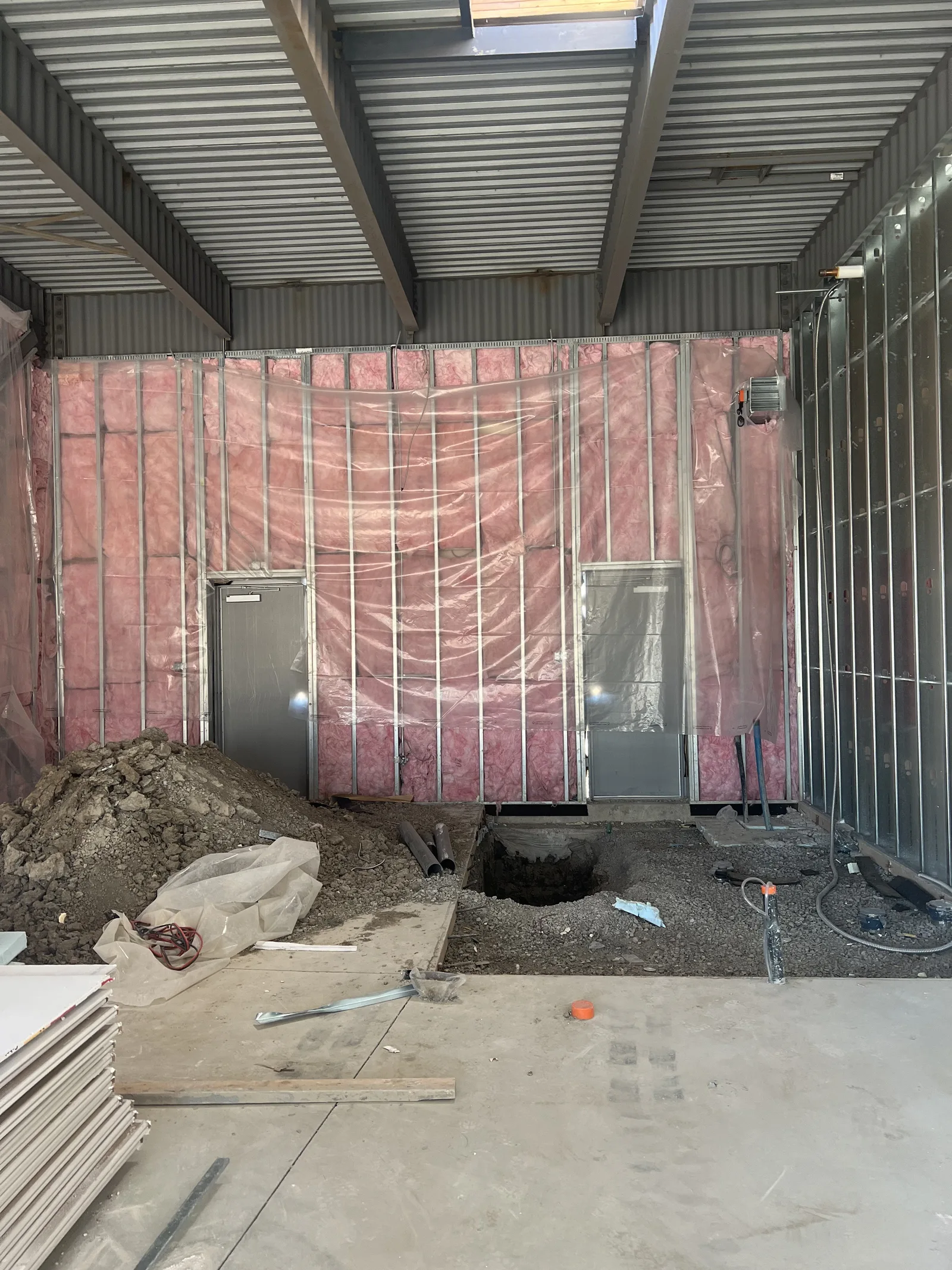 Batt insulation installed between studs in a framed wall