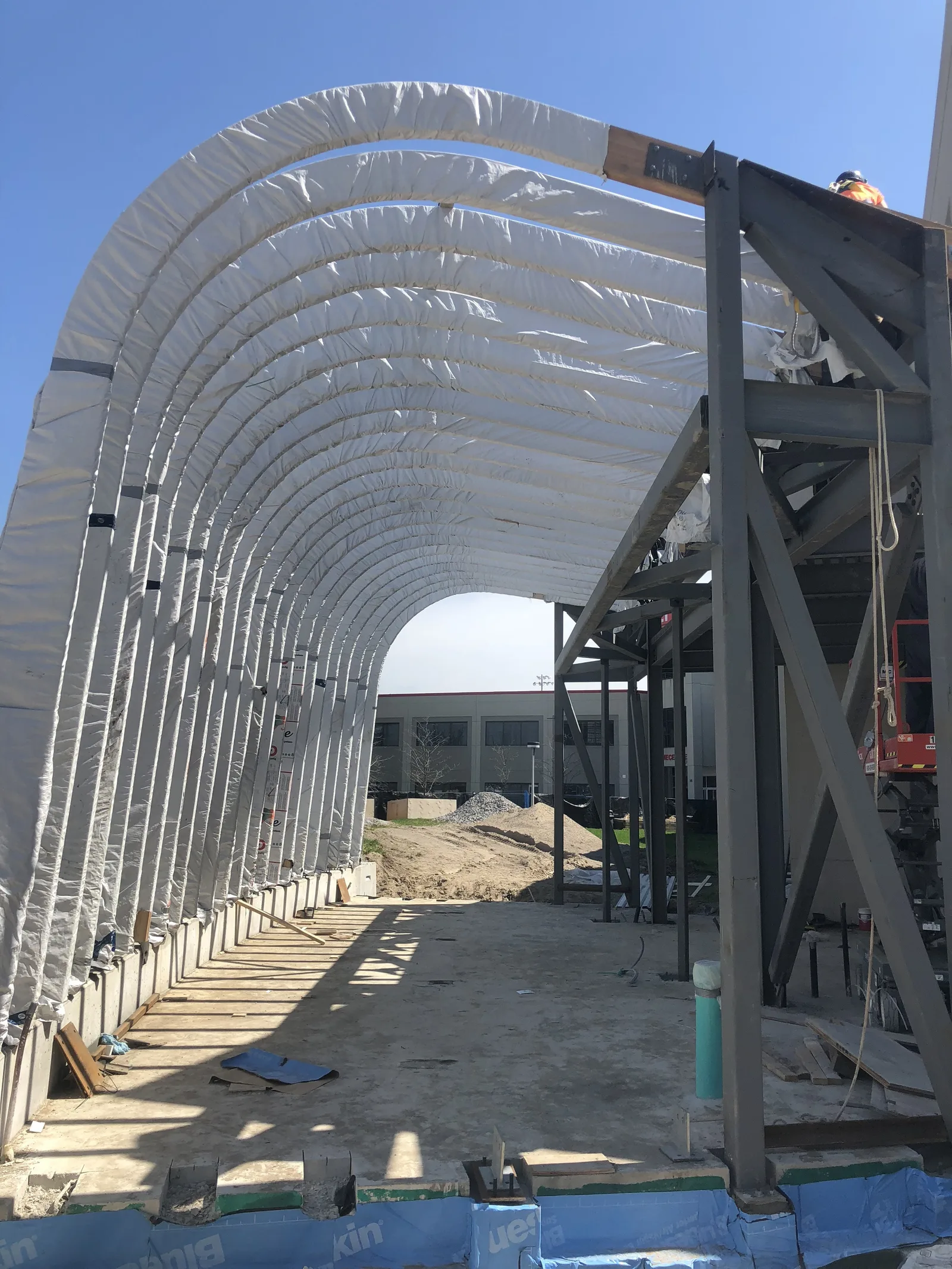 Curved steel framing for an arched exterior feature