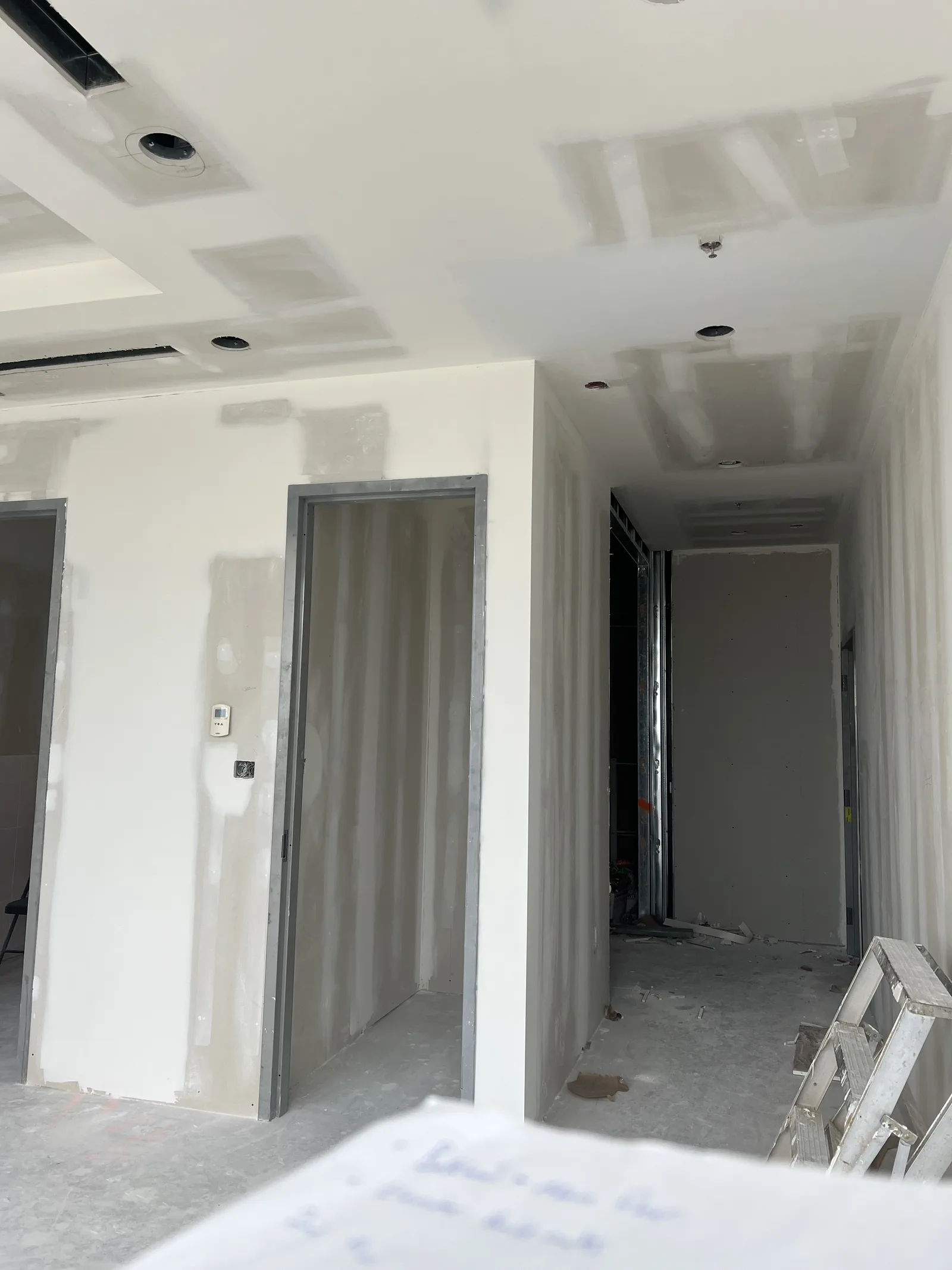 Finished drywall rooms and openings ready for paint