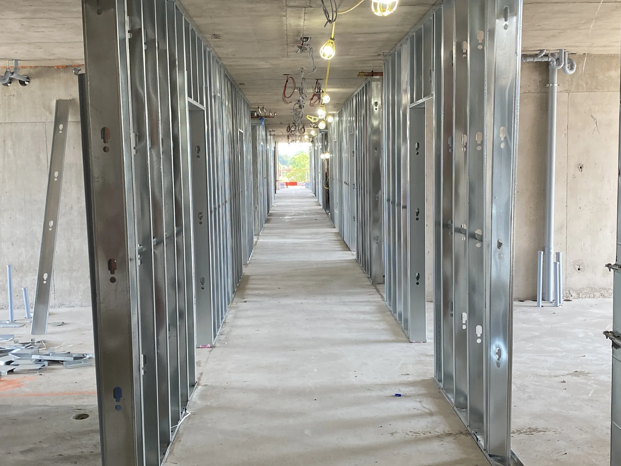 Steel stud corridor walls framed in a multi-unit building