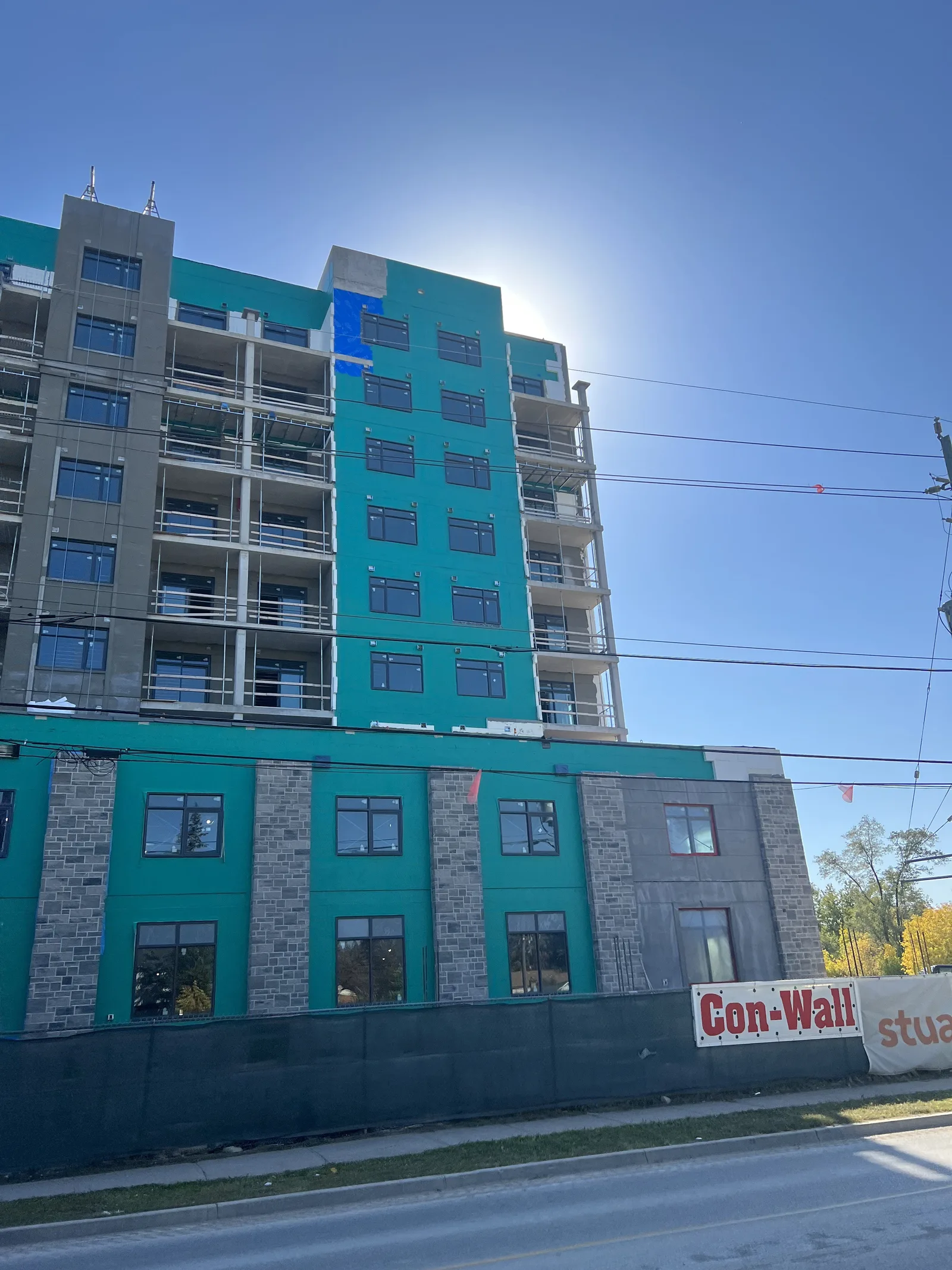 Completed high-rise residential tower with a finished exterior